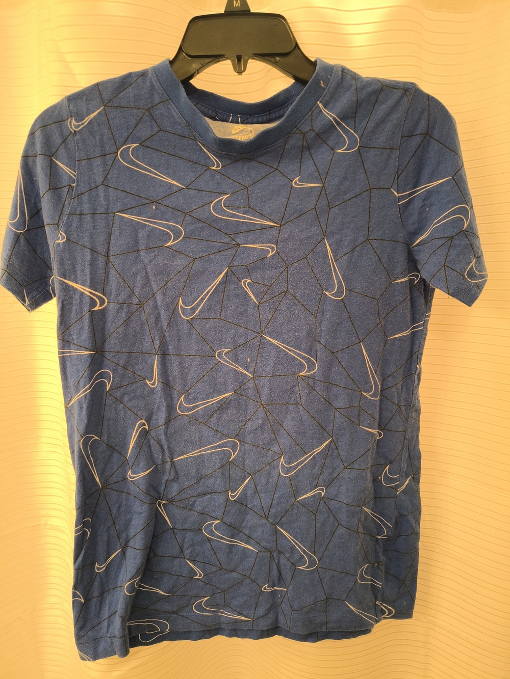 Nike Blue Short-Sleeve Tee with Repeated Swoosh Pattern